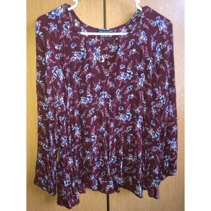 Long sleeve burgundy blouse with flowered pattern